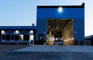 Liquids in Motion new drive-through wash bay with a truck ready to be washed